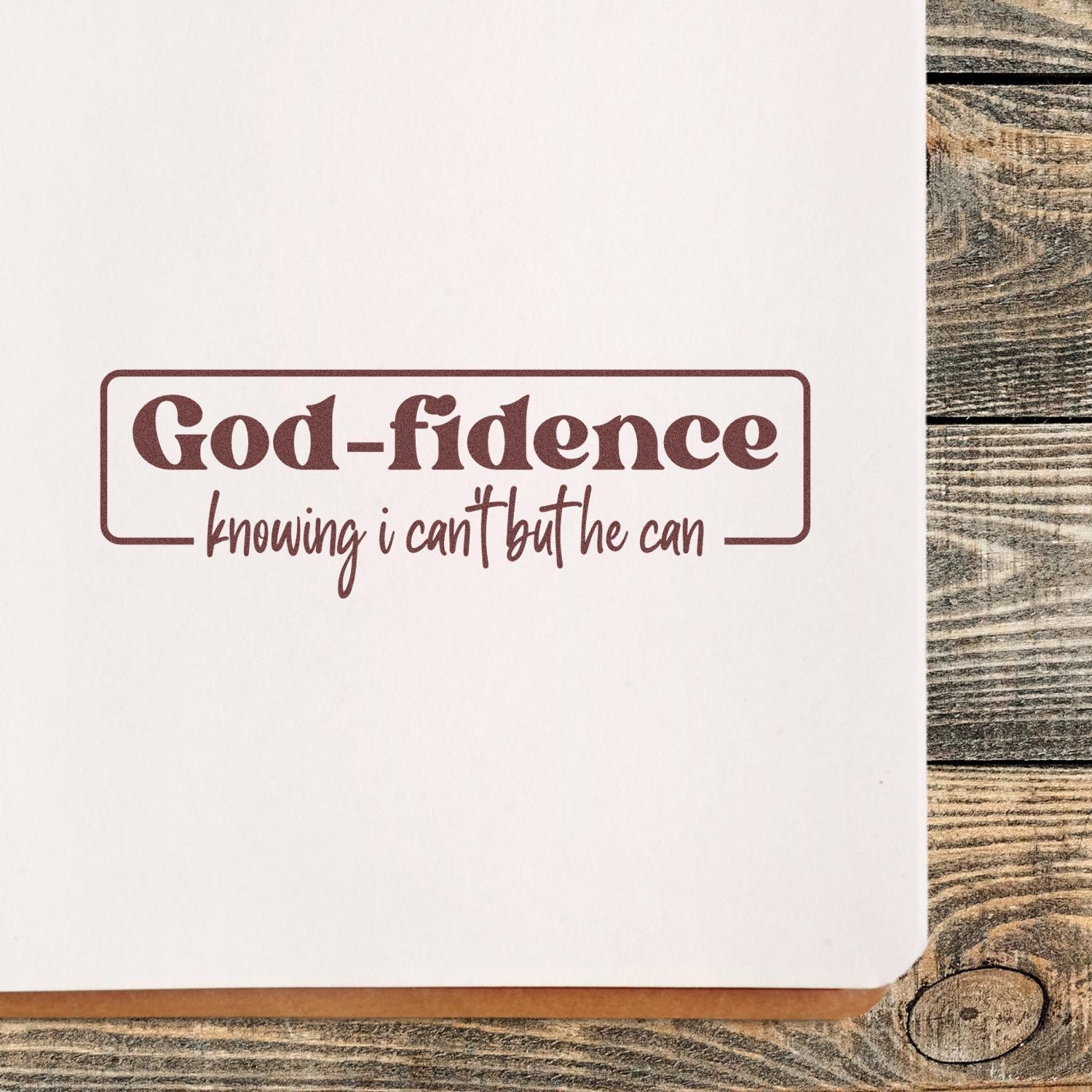 Christian rubber stamp reading God-fidence, knowing I can but He can with an inspirational faith quote on paper.