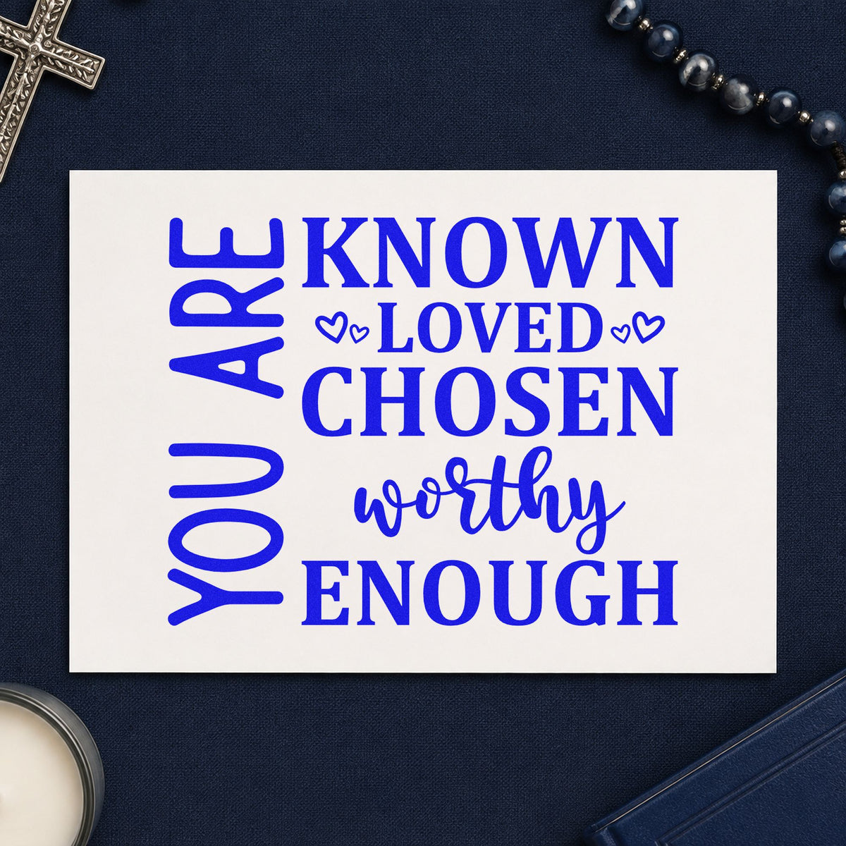 You Are Known Loved Chosen craft stamp imprinted in blue ink on paper, a design suited to youth retreat favors.