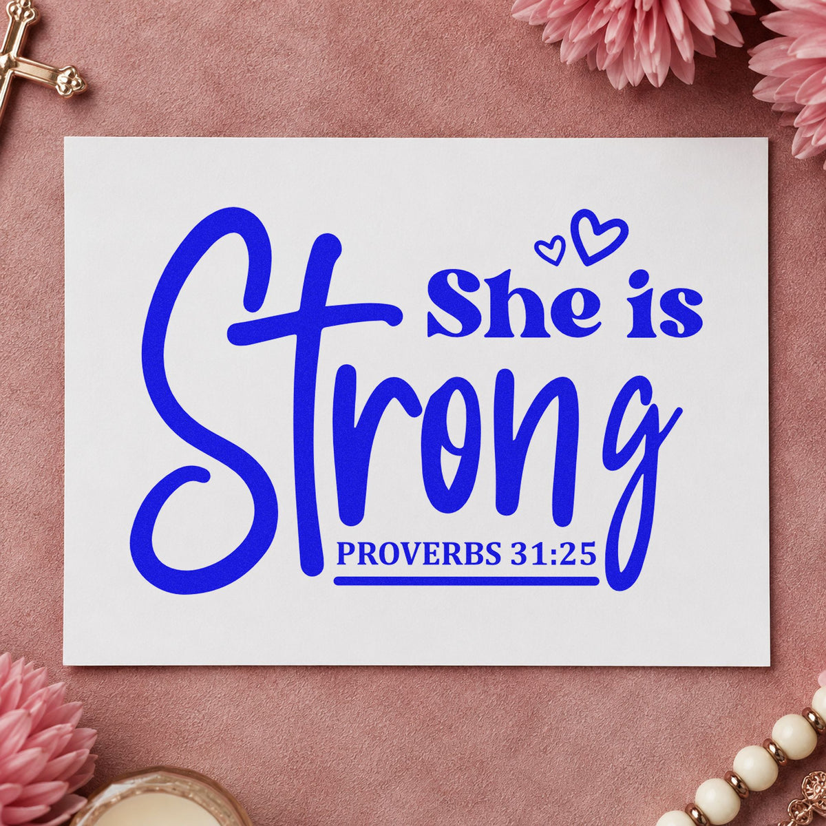 She Is Strong Cross Script craft stamp in blue ink on cardstock, an easy option for canvas totes.