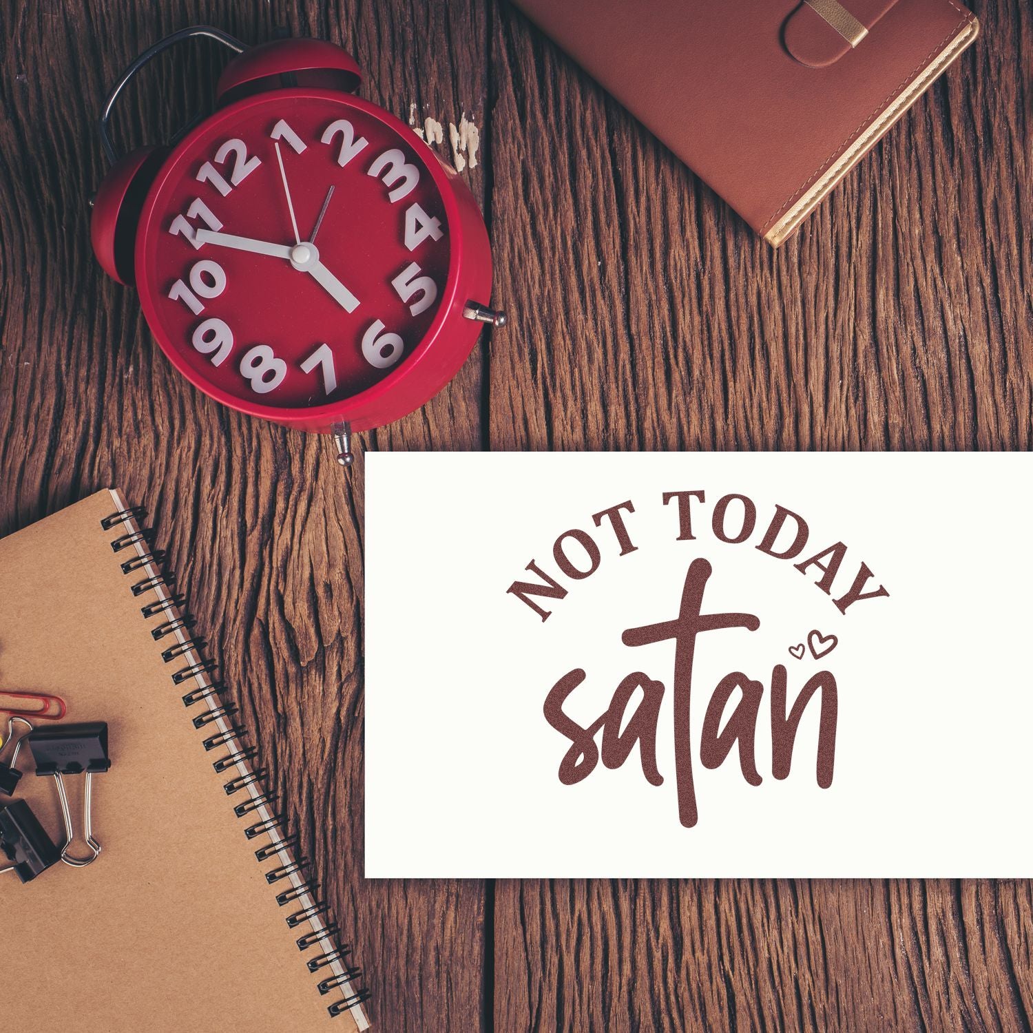 Not Today Satan rubber stamp design mockup with clock, notebook, and stationery on a wooden desk