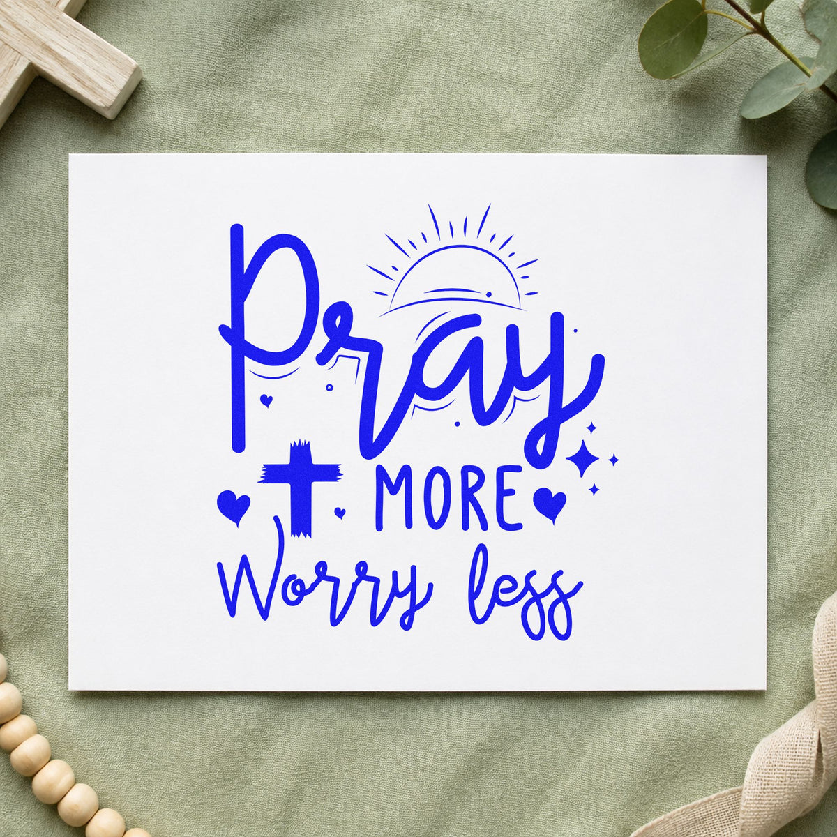 Pray More Worry Less Sunrise craft stamp imprinted in blue ink on paper, a design suited to nurse station notes.
