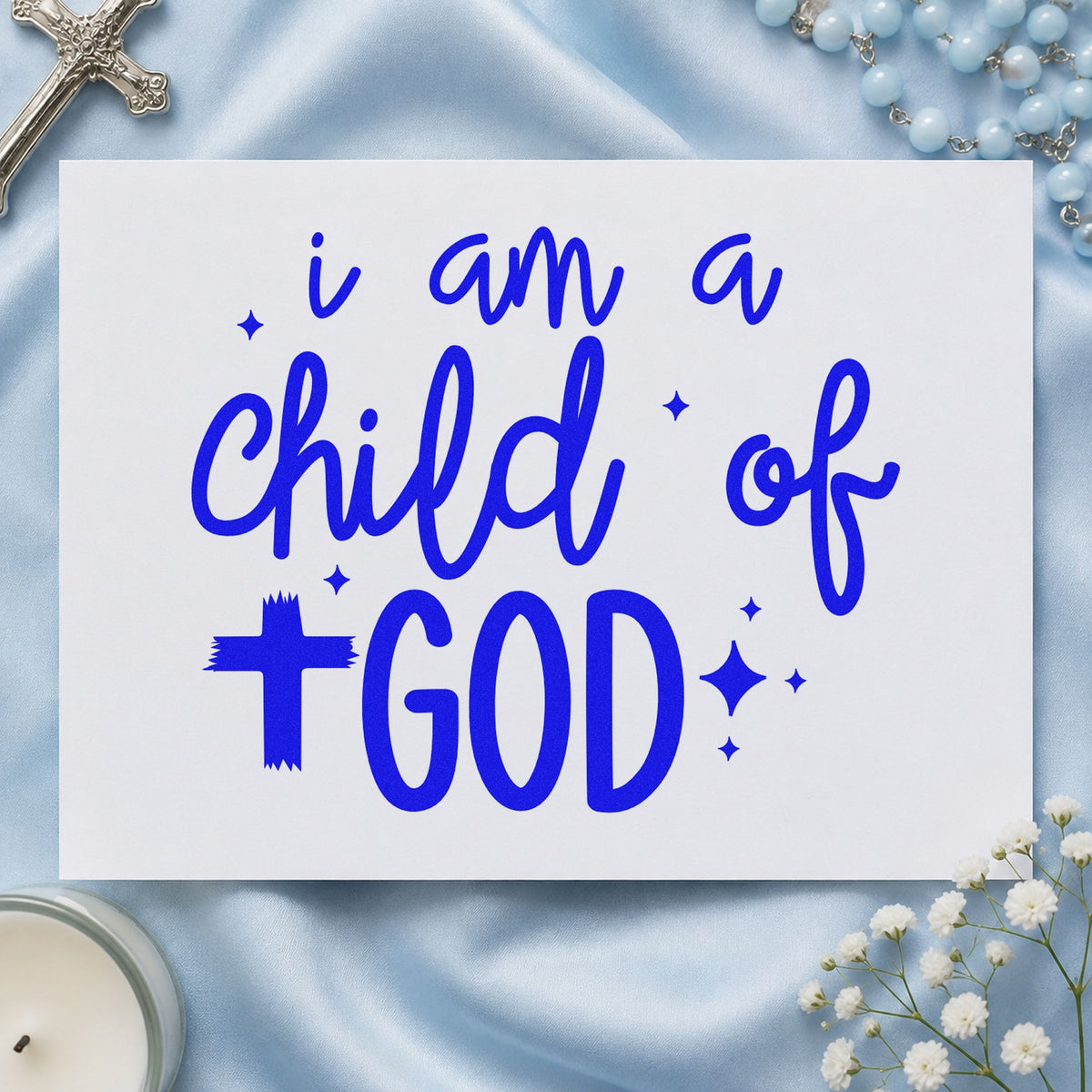 I Am a Child of God craft stamp imprinted in blue ink on paper, a design suited to sunday school crafts.