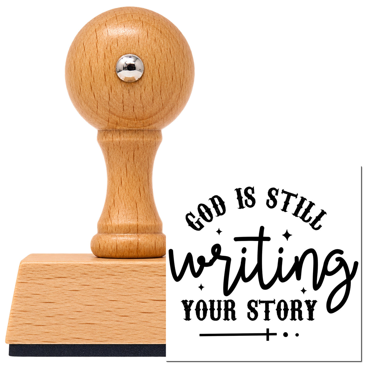 God Is Writing Your Story With Cross Vintage Pro rubber stamp in European beech wood with a round knob handle, shown beside its black imprint.