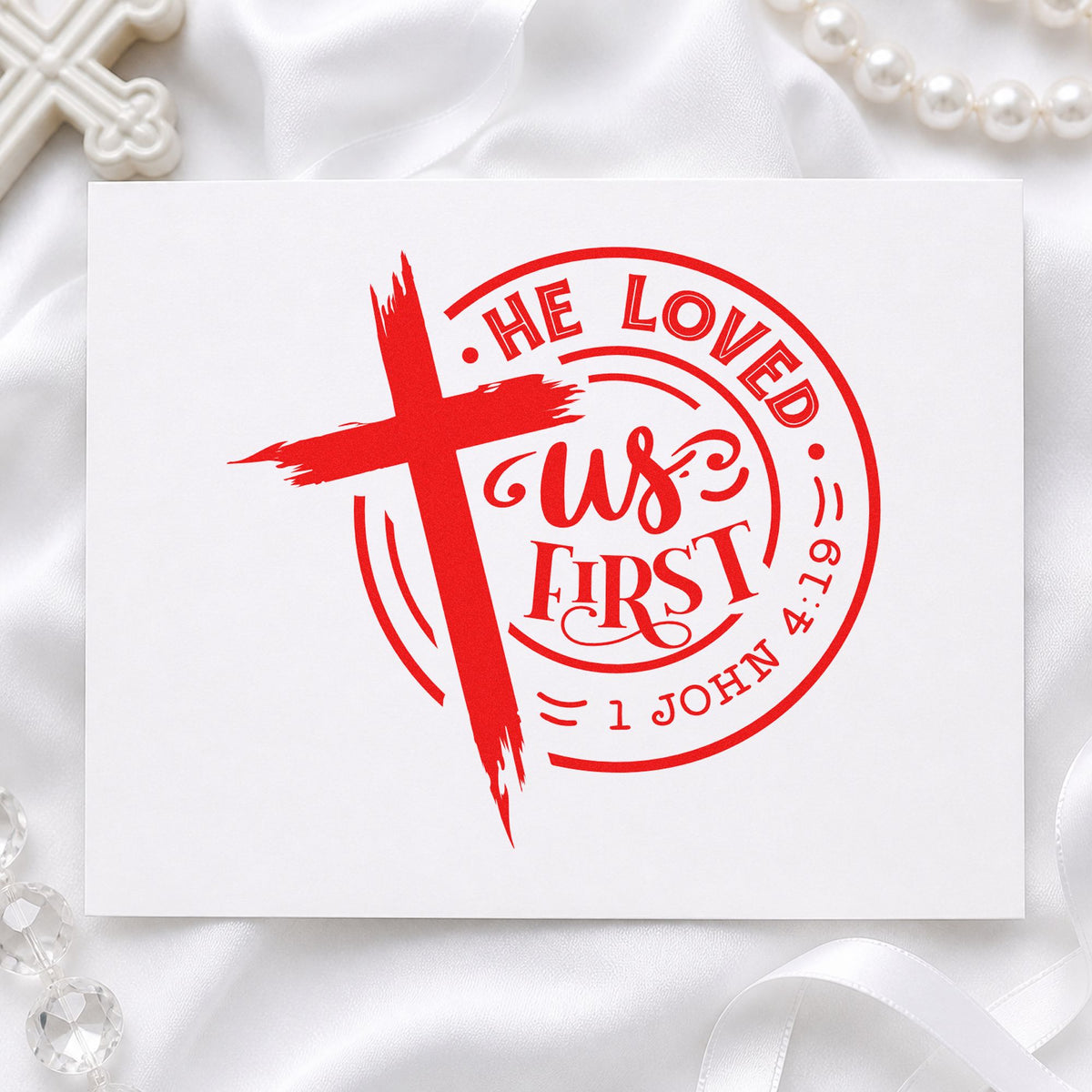He Loved Us First Badge rubber stamp shown in red ink, stamped for projects such as valentine care notes.