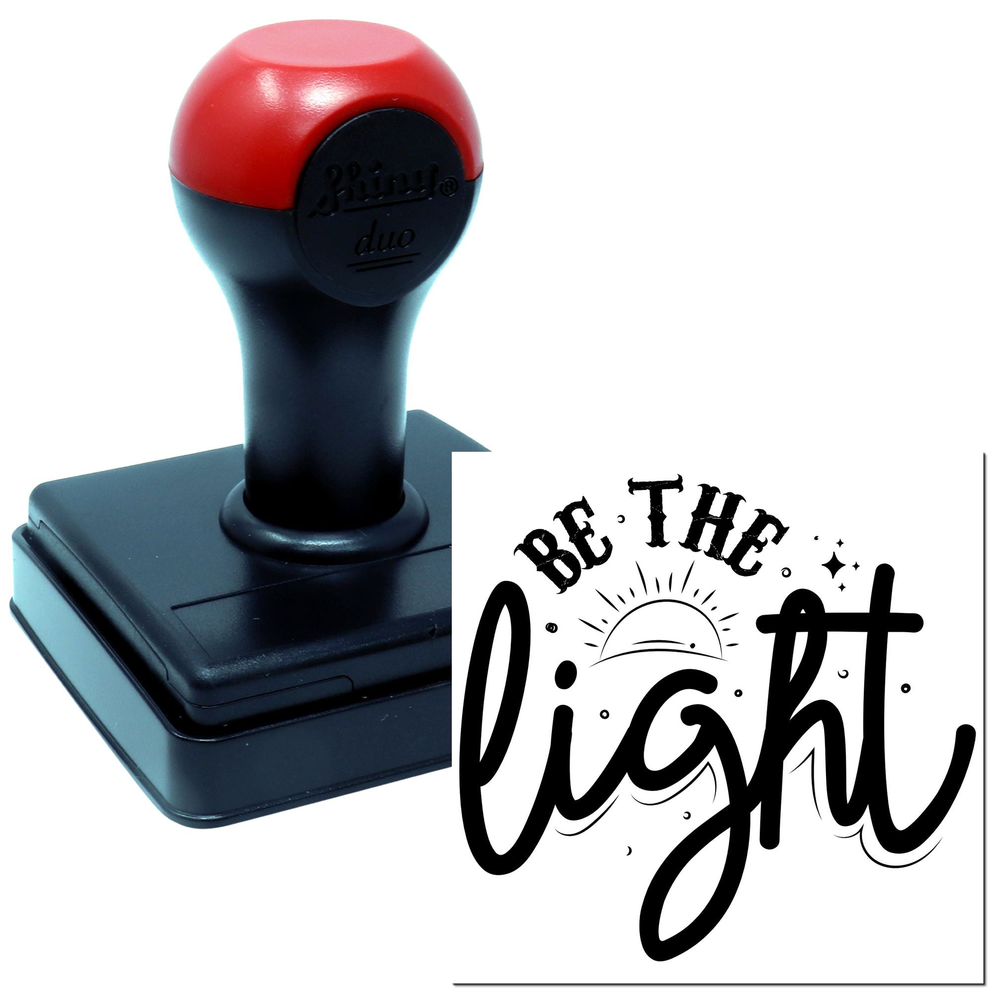 Self-inking rubber stamp with Be the Light inspirational design for crafts, branding, and personalized paper projects.