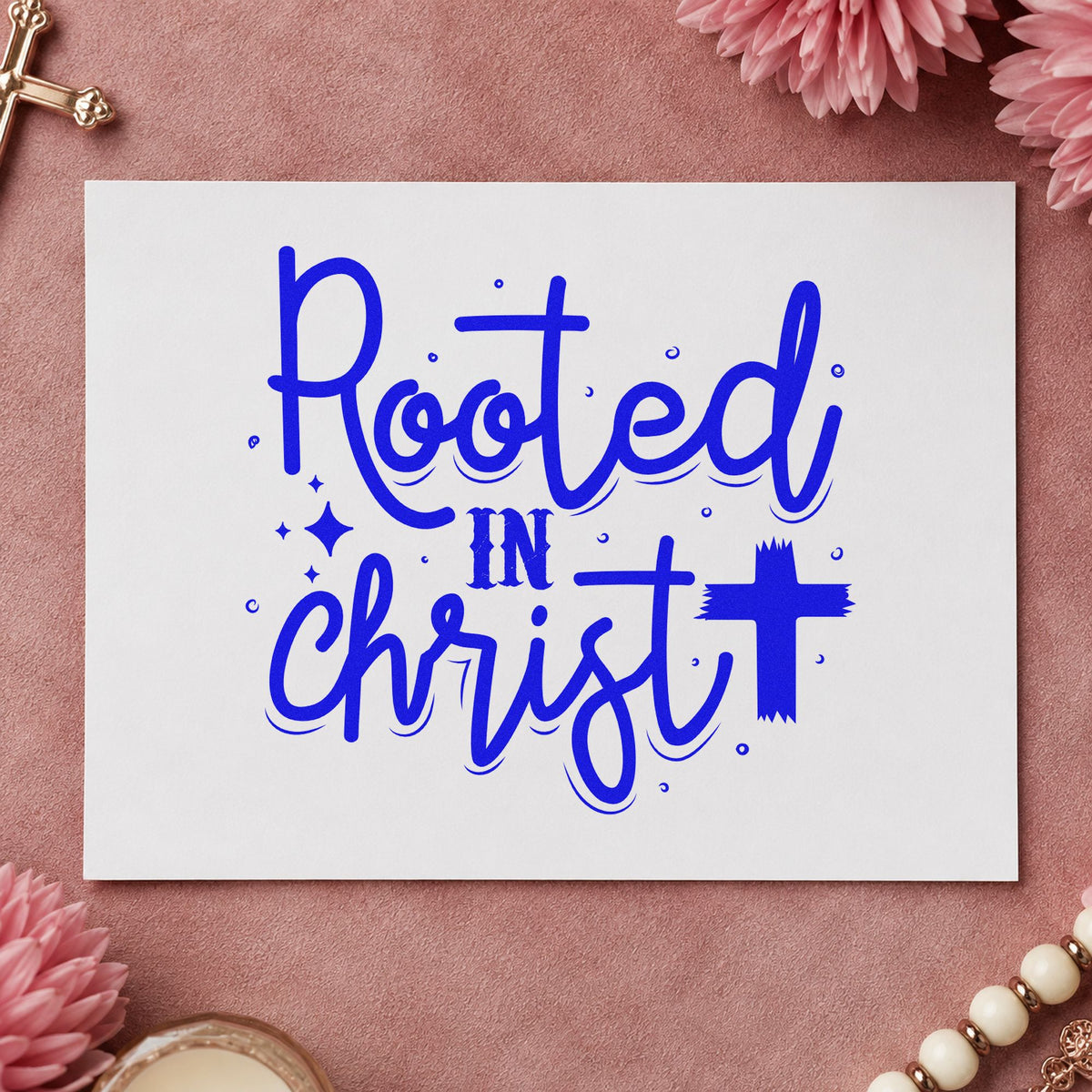 Rooted in Christ Script craft stamp imprinted in blue ink on paper, a design suited to nursery shop seals.