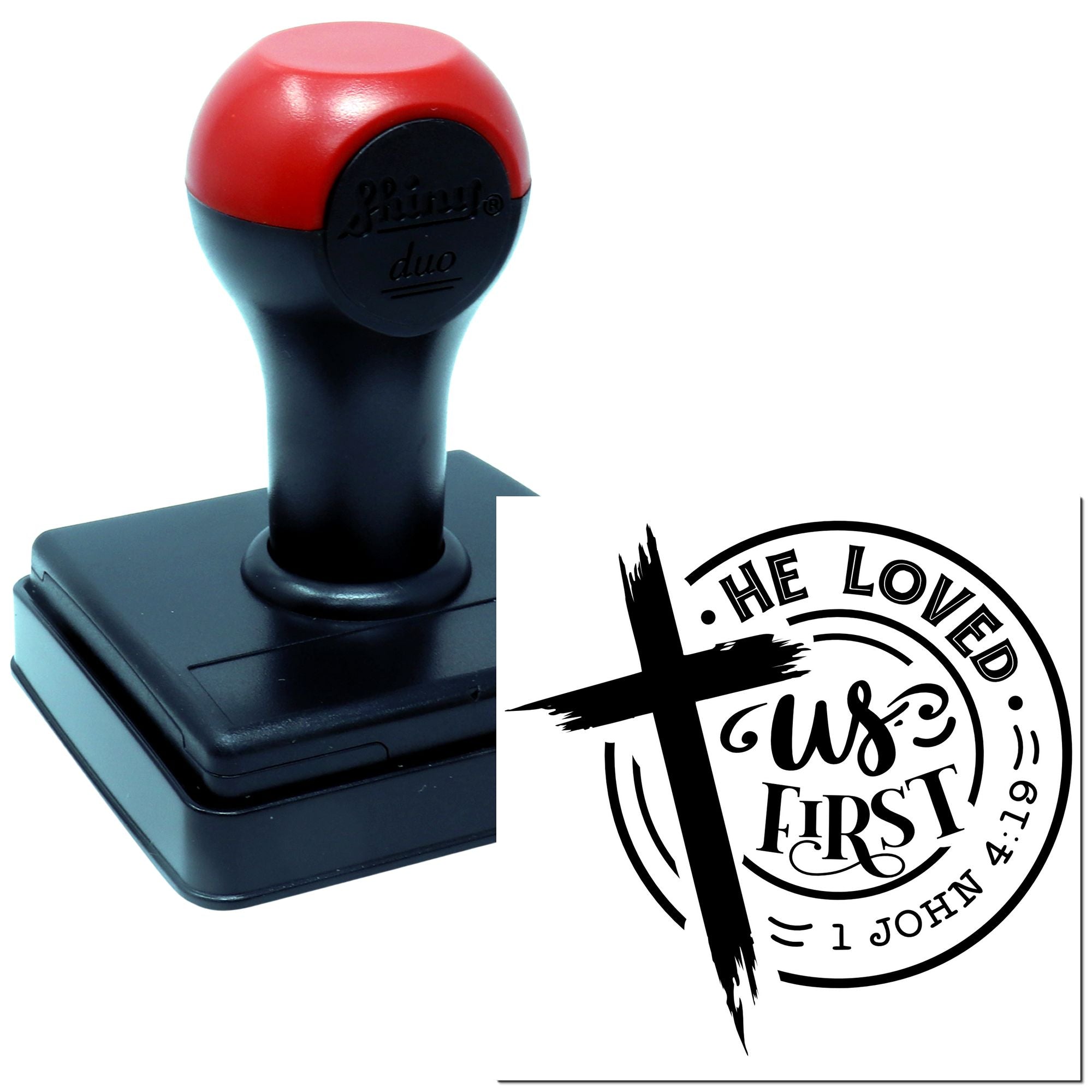 Custom religious self-inking rubber stamp with He Loved Us First and John 4:19 Bible verse design.