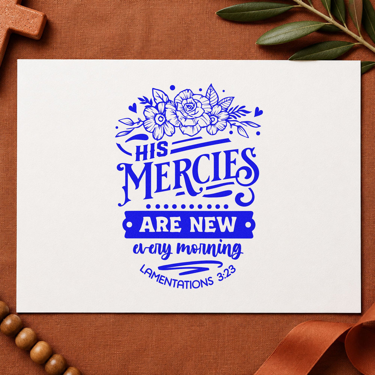 New Mercies Outline Roses craft stamp in blue ink on cardstock, an easy option for linen napkin corners.