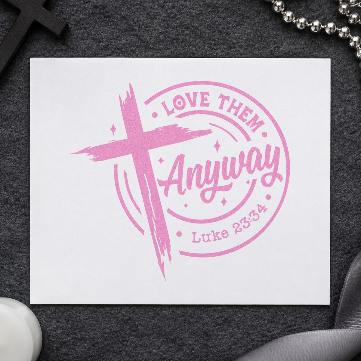 Love Them Anyway craft stamp in purple ink on cardstock, an easy option for peacemaker gift tags.
