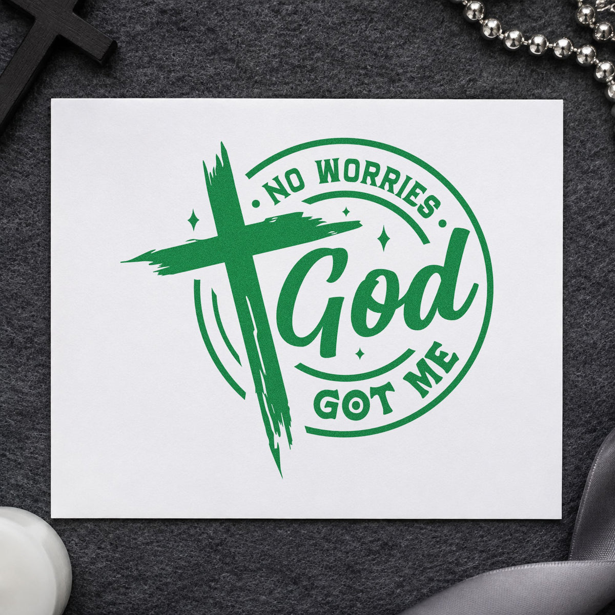 No Worries God Got Me Badge craft stamp imprint in green ink on a handmade project, one idea being travel journal pages.