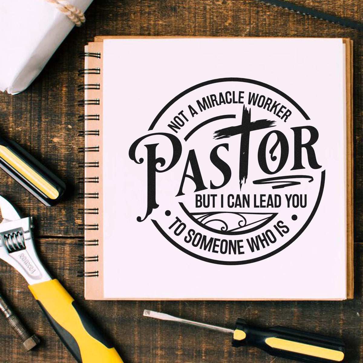 Pastor Not A Miracle Worker With Cross Premium Wooden Stamp - Vintage Pro imprint stamped in black ink. A cross forms part of "Pastor" inside a circle reading "Not a miracle worker, but I can lead you to someone who is."