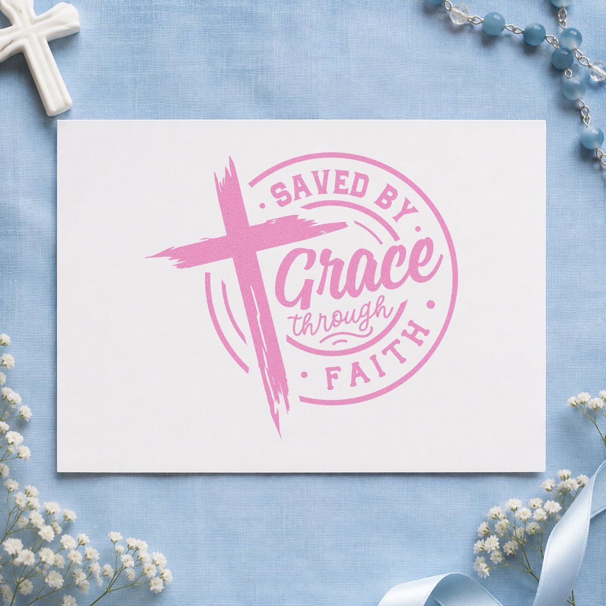 Saved by Grace Through Faith craft stamp in purple ink on cardstock, an easy option for baptism towel tags.