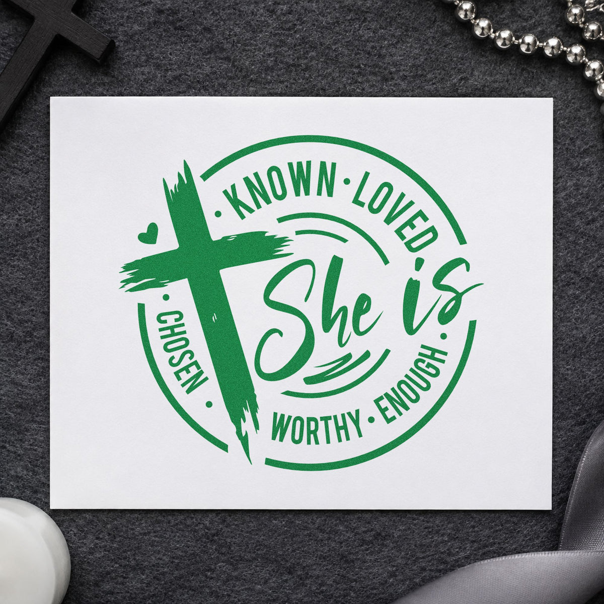 She Is Known Loved Worthy craft stamp imprint in green ink on a handmade project, one idea being framed bedroom art.