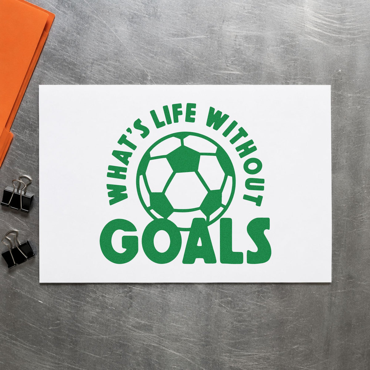 Life Without Goals Ball craft stamp imprint in green ink on a handmade project, one idea being framed rec room art.
