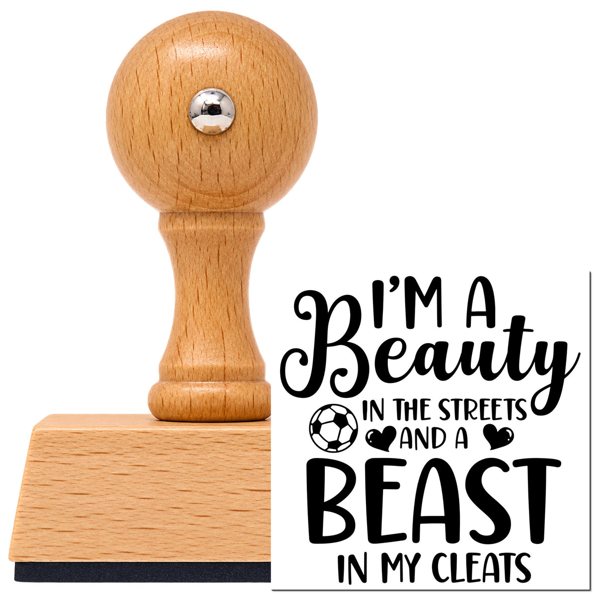 I'm A Beauty In The Streets And A Beast In My Cleats Vintage Pro rubber stamp in European beech wood with a round knob handle, shown beside its black imprint.