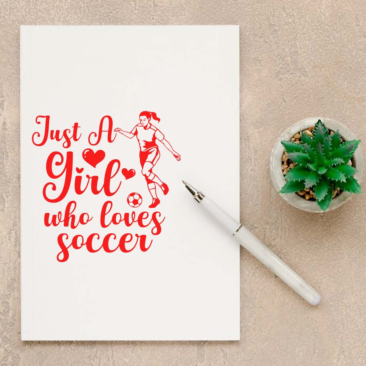 Soccer girl rubber stamp design reading Just a Girl Who Loves Soccer with player, hearts, and ball for sports crafts.
