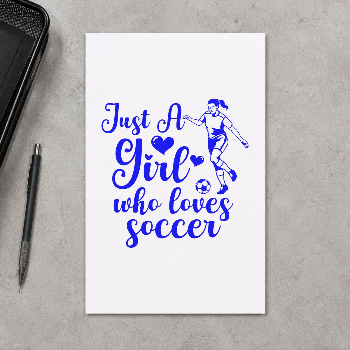 Girl Who Loves Soccer Player craft stamp imprinted in blue ink on paper, a design suited to craft fair sign cards.