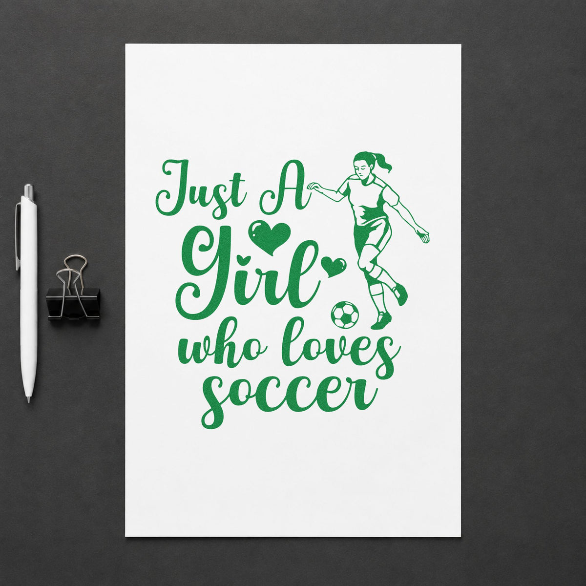 Girl Who Loves Soccer Player craft stamp imprint in green ink on a handmade project, one idea being framed playroom wall.