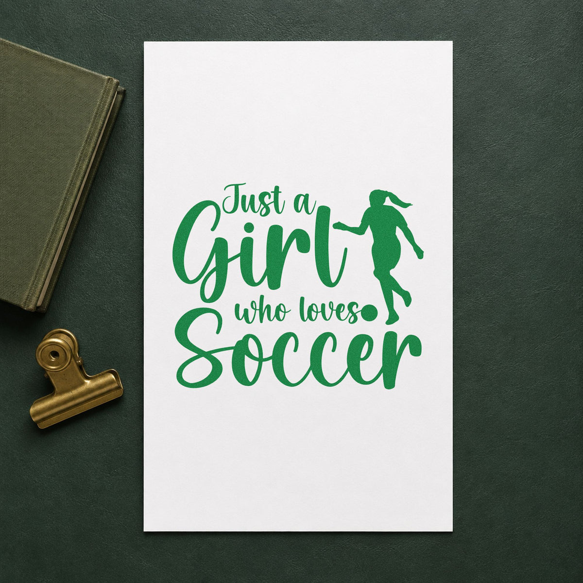 Girl Who Loves Soccer Silhouette craft stamp imprint in green ink on a handmade project, one idea being yearbook page corners.
