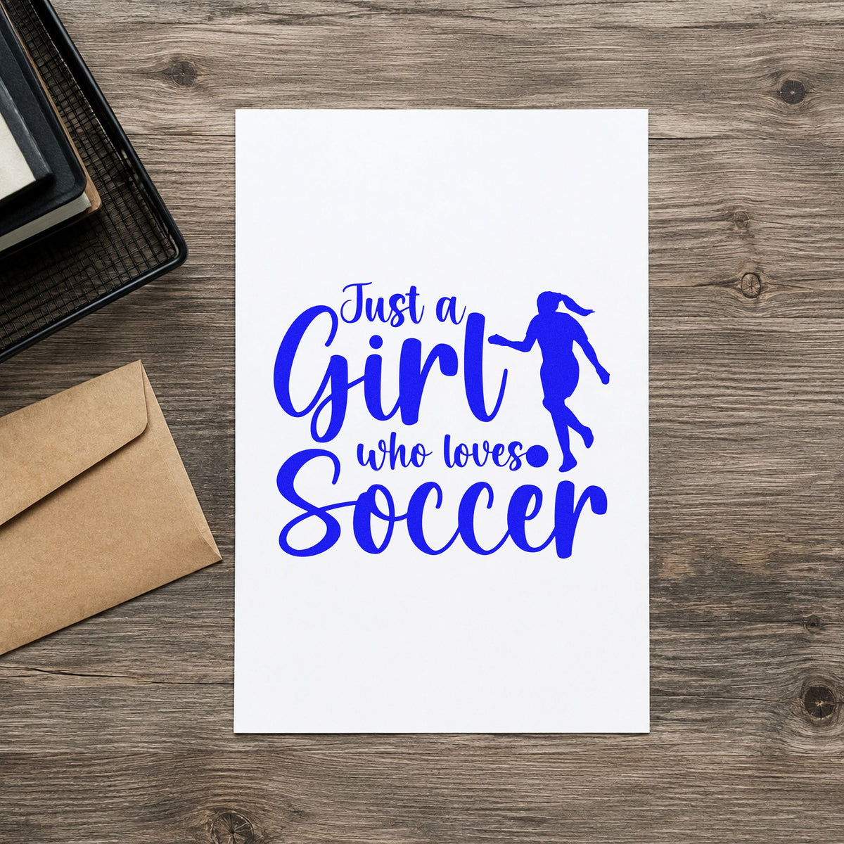 Girl Who Loves Soccer Silhouette craft stamp in blue ink on cardstock, an easy option for warmup jacket backs.
