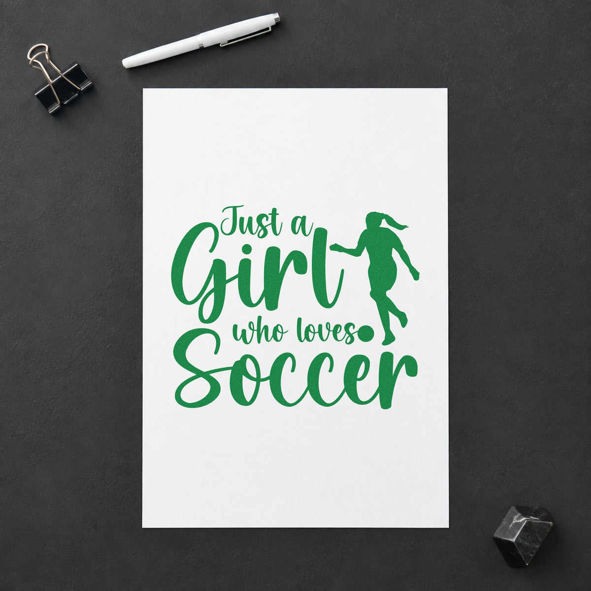 Girl Who Loves Soccer Silhouette craft stamp imprint in green ink on a handmade project, one idea being framed locker door.