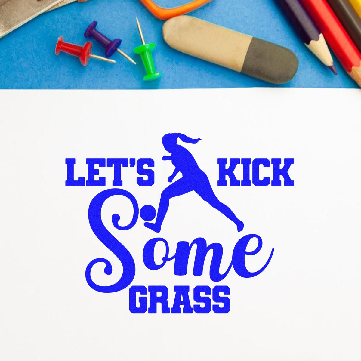 Let's Kick Some Grass rubber stamp shown in blue ink, stamped for projects such as pregame snack tags.