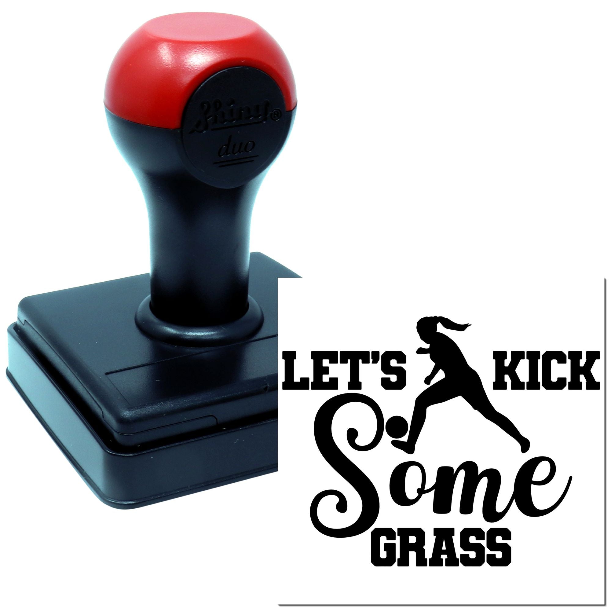Self-inking rubber stamp with sample impression reading Lets Kick Some Grass and soccer player silhouette.