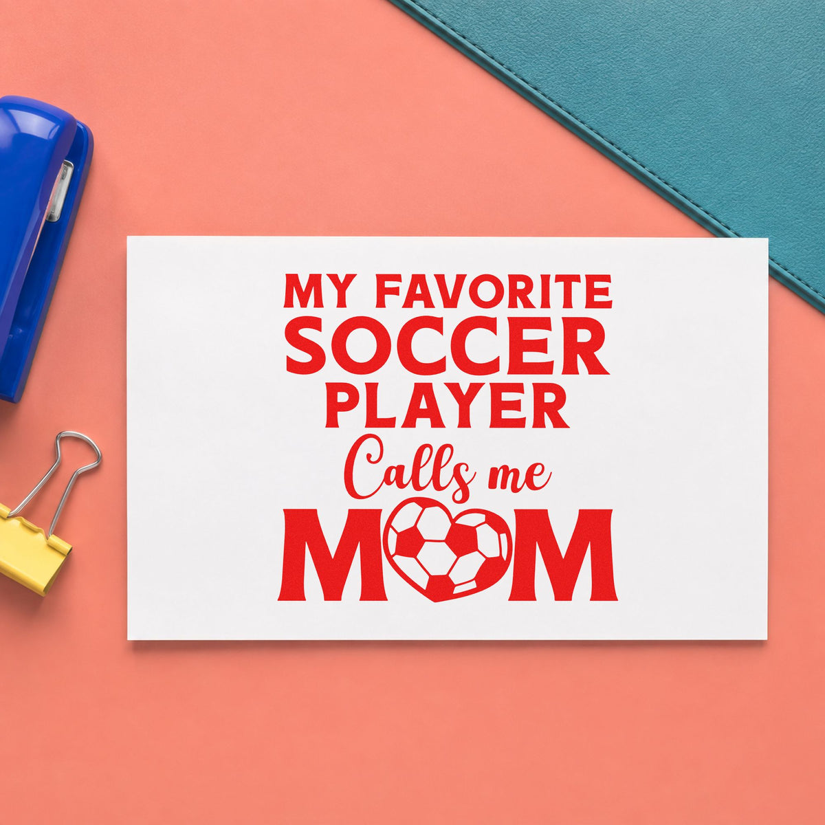 Favorite Soccer Player Calls Me Mom rubber stamp shown in red ink, stamped for projects such as last game notes.