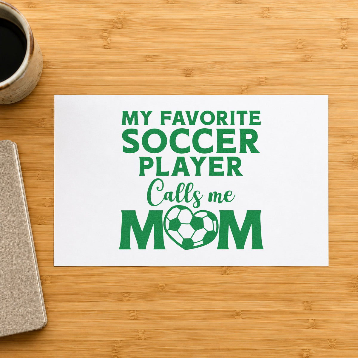 Favorite Soccer Player Calls Me Mom craft stamp imprint in green ink on a handmade project, one idea being framed entry bench.