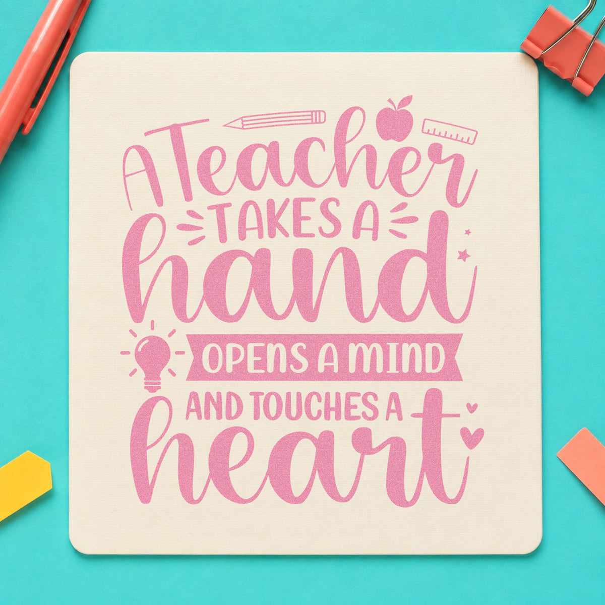 Teacher Touches a Heart craft stamp in purple ink on cardstock, an easy option for appreciation week tags.