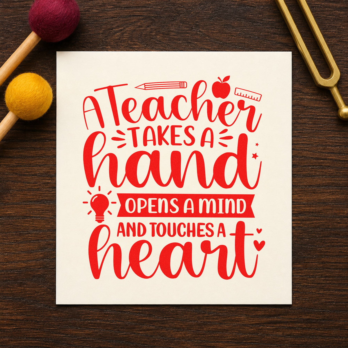 Teacher Touches a Heart rubber stamp shown in red ink, stamped for projects such as award night notes.
