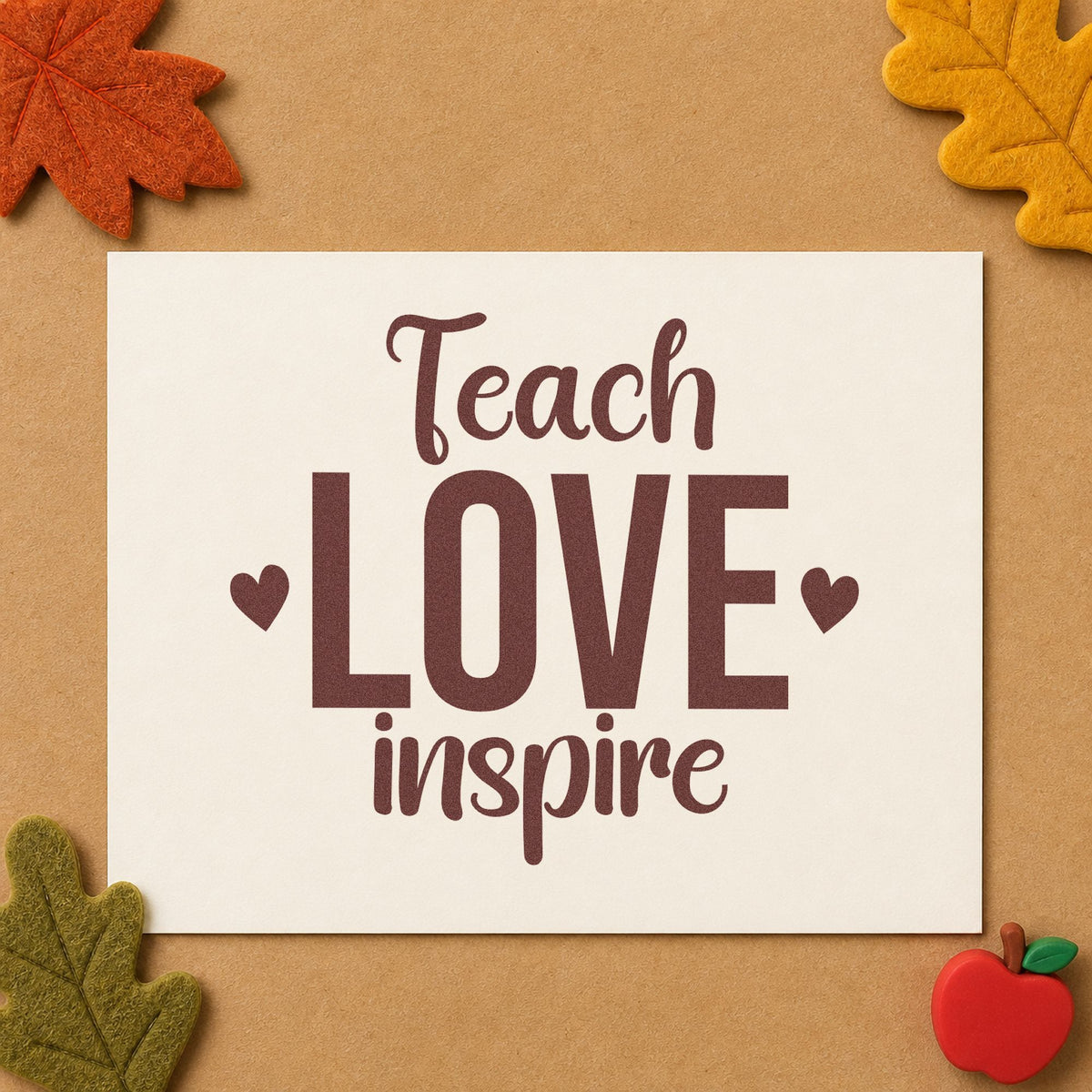 Teach Love Inspire rubber stamp printed in brown ink, ready for heart token crafts and similar paper crafts.