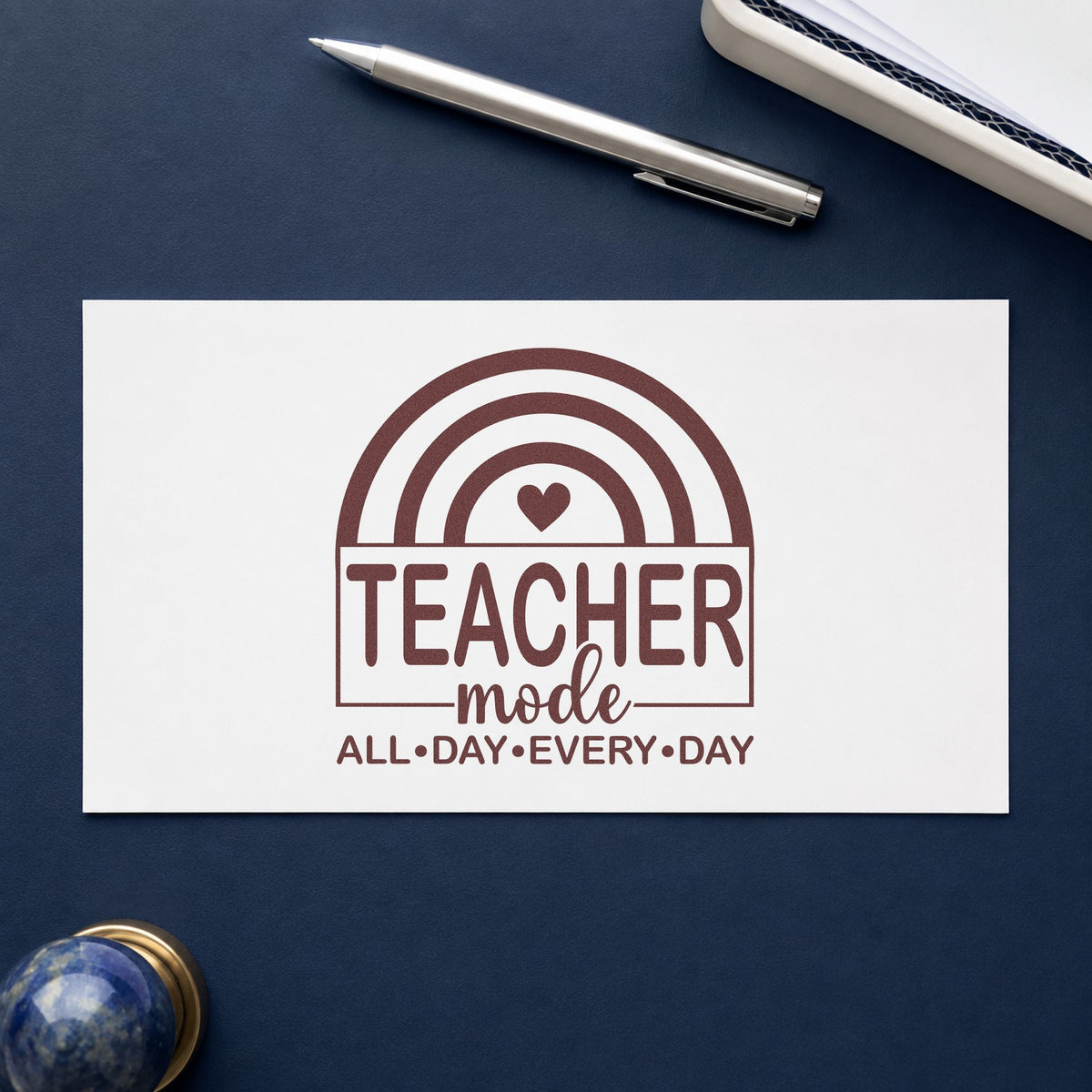 Teacher Mode Rainbow rubber stamp printed in brown ink, ready for alarm card crafts and similar paper crafts.