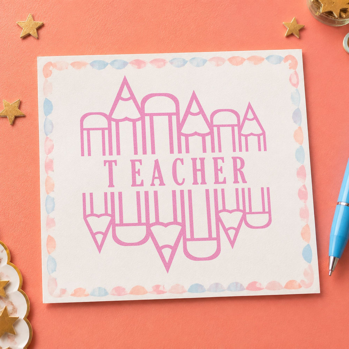 Teacher Pencil Circle craft stamp in purple ink on cardstock, an easy option for sharpener kit tags.