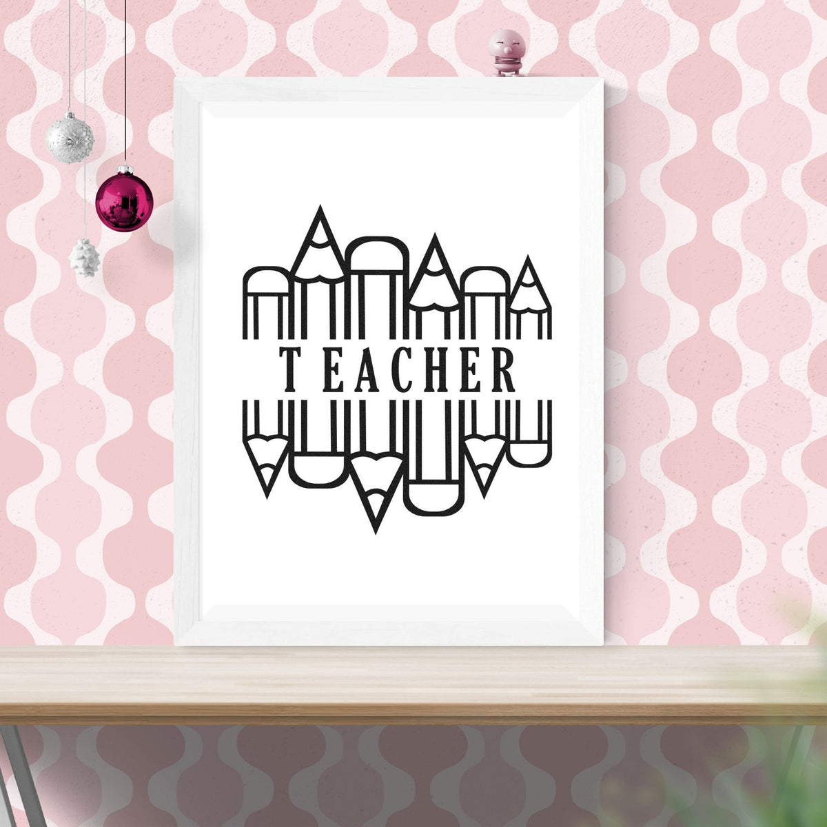 Teacher Pencil Circle Frame Accent Premium Wooden Stamp - Vintage Pro imprint stamped in black ink. Outlined pencils pointing upward and downward form a rounded frame around "Teacher."