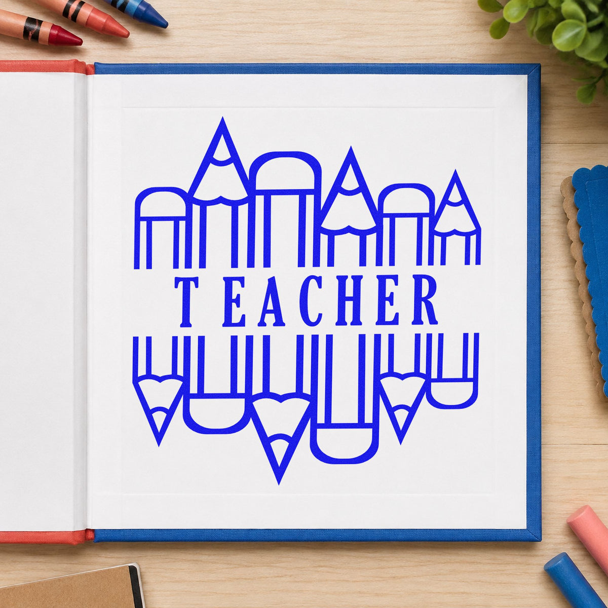Teacher Pencil Circle craft stamp imprinted in blue ink on paper, a design suited to supply drive labels.