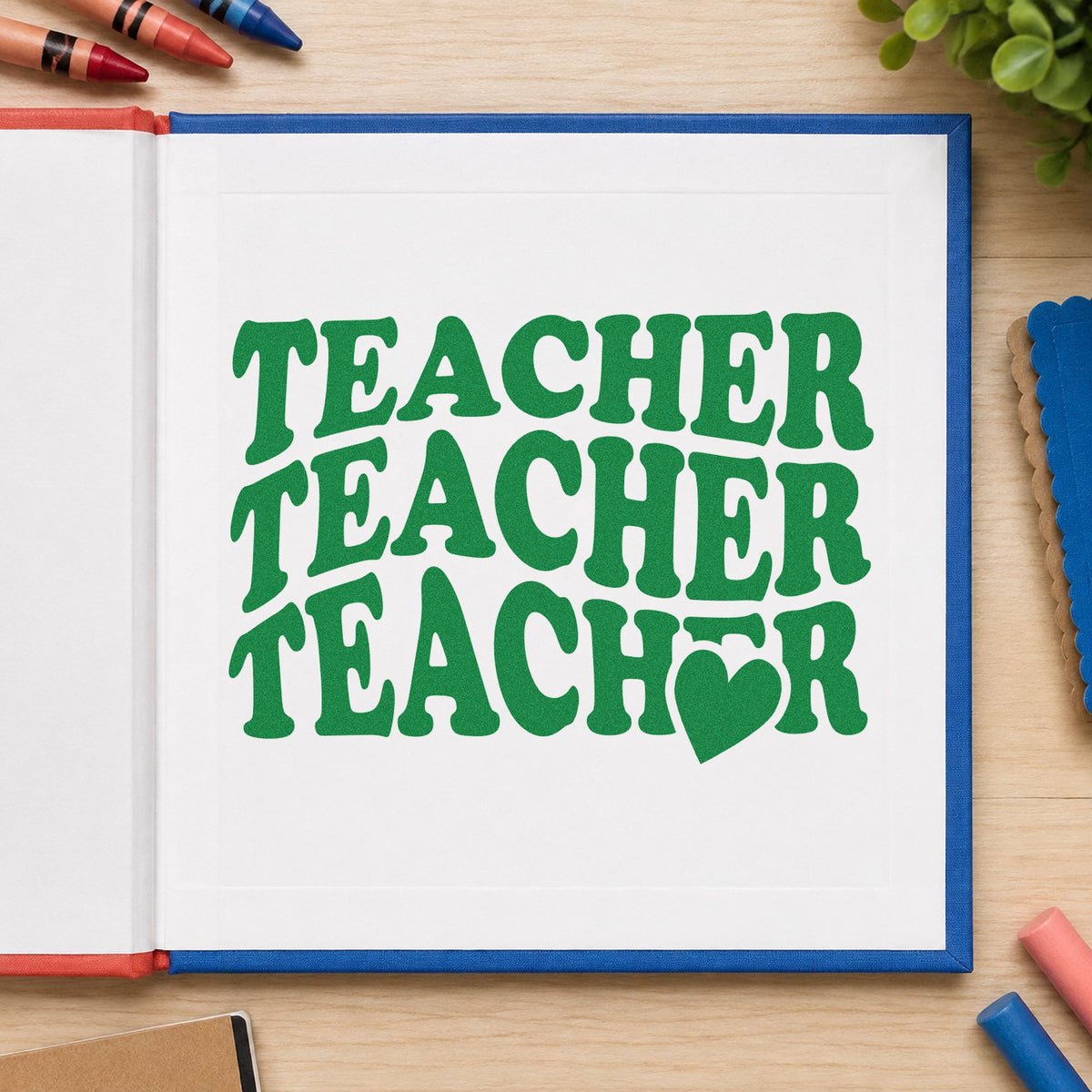 Teacher Triple Heart Stack craft stamp imprint in green ink on a handmade project, one idea being grade team pages.