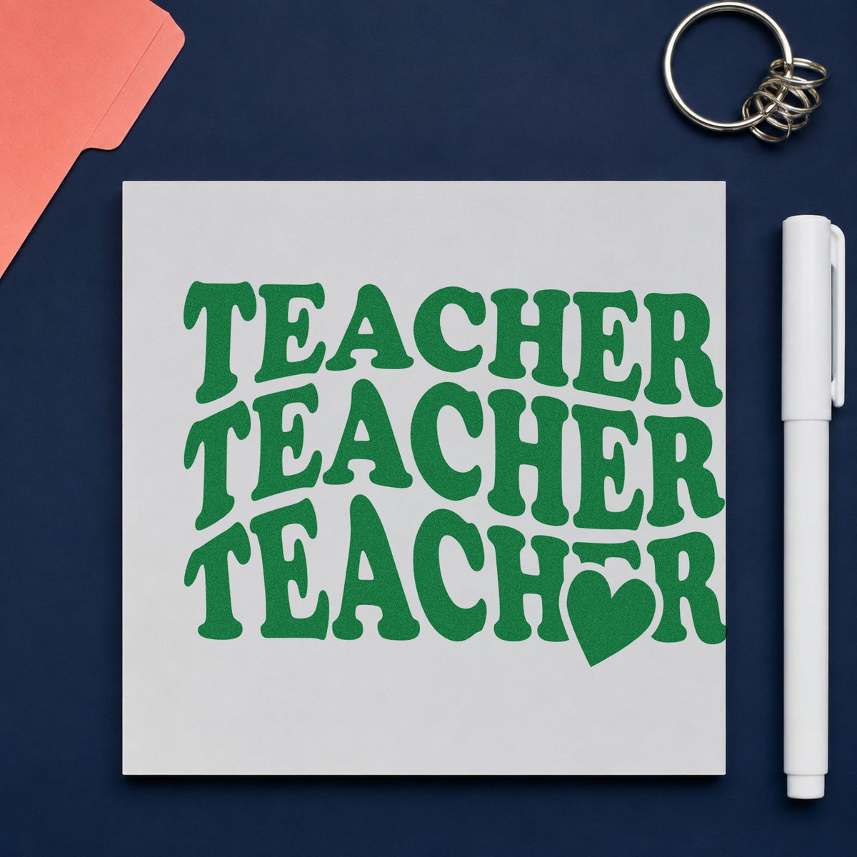Teacher Triple Heart Stack craft stamp imprint in green ink on a handmade project, one idea being framed hall trio.