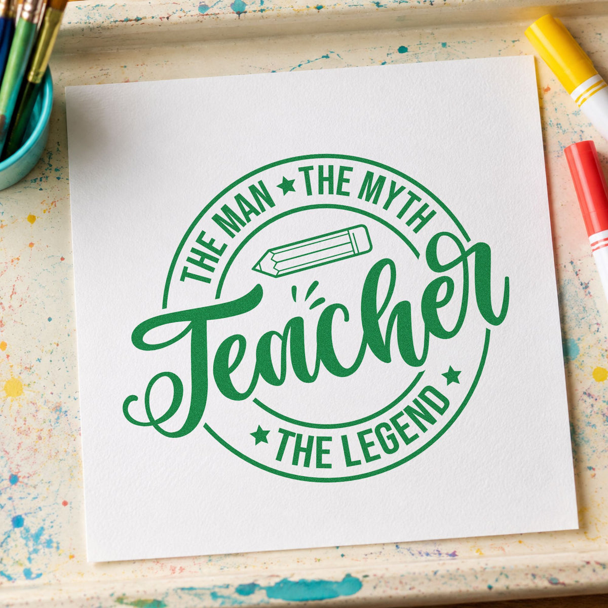 Teacher the Man Myth Legend craft stamp imprint in green ink on a handmade project, one idea being locker room pages.