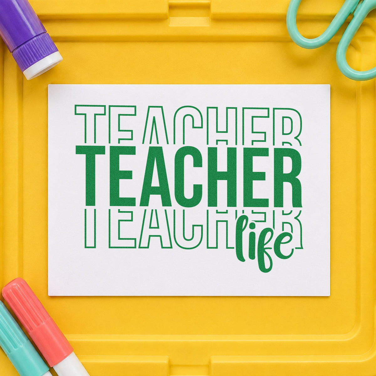 Teacher Life Outline Stack craft stamp imprint in green ink on a handmade project, one idea being sticker sheet pages.