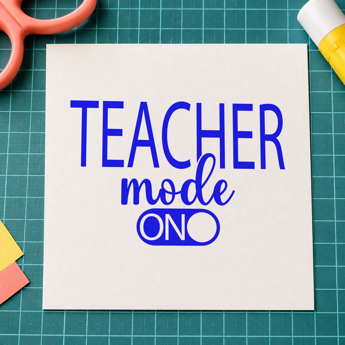 Teacher Mode On craft stamp in blue ink on cardstock, an easy option for charging cart panels.