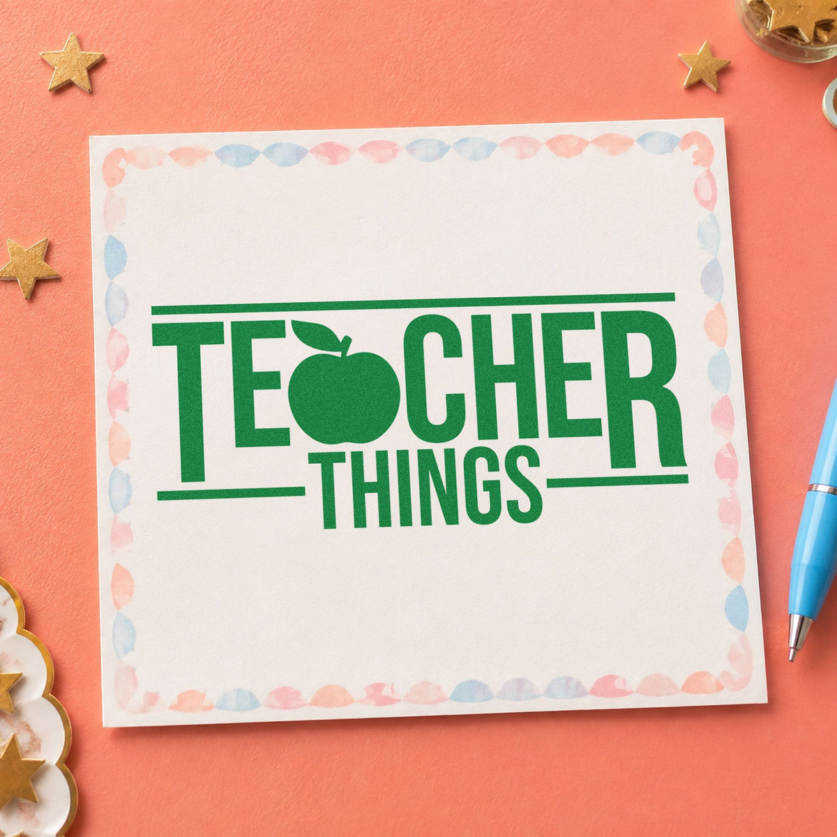 Teacher Things craft stamp imprint in green ink on a handmade project, one idea being inventory sheet pages.