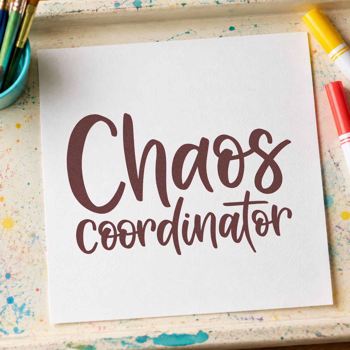 Chaos Coordinator rubber stamp printed in brown ink, ready for clipboard card crafts and similar paper crafts.