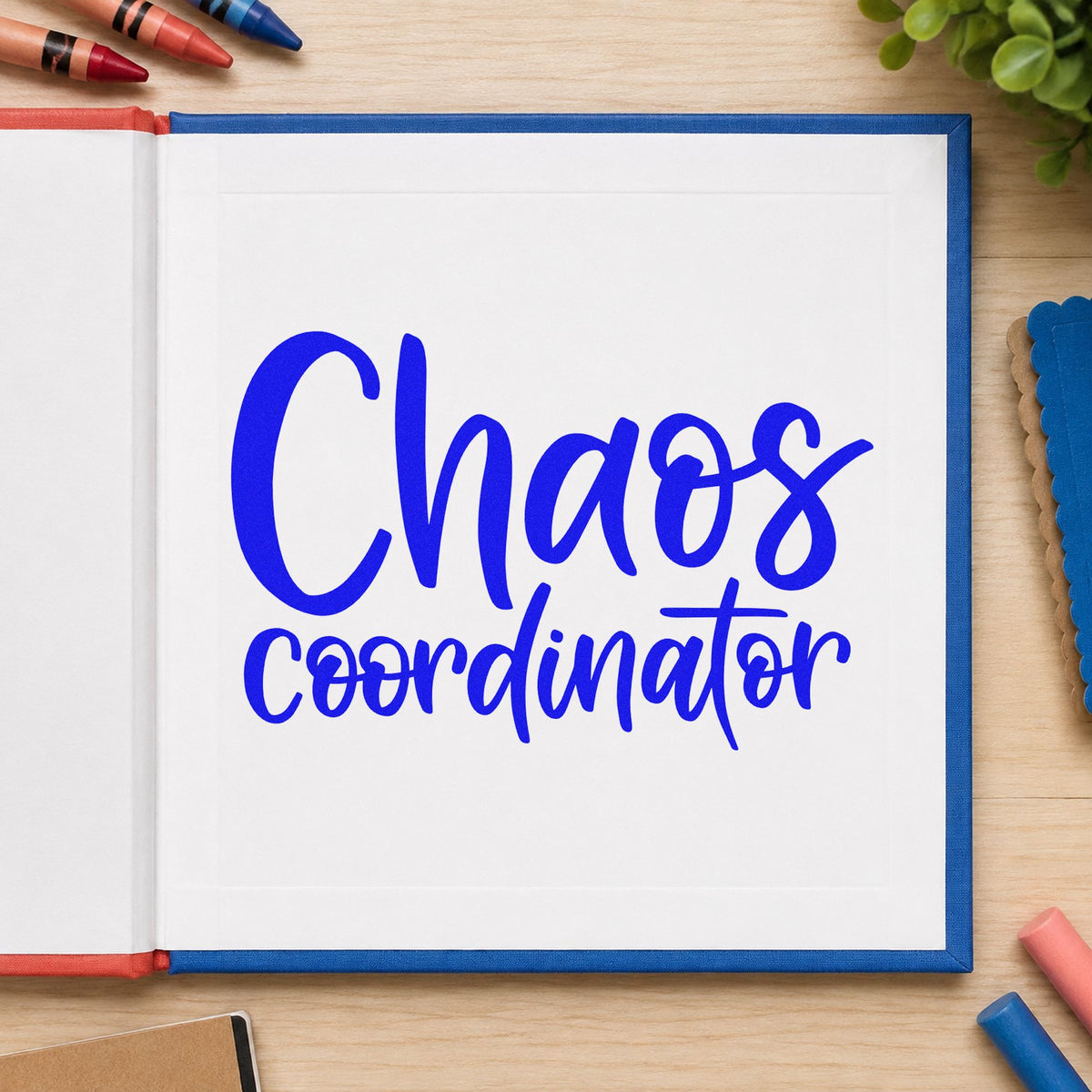 Chaos Coordinator craft stamp imprinted in blue ink on paper, a design suited to emergency bin labels.