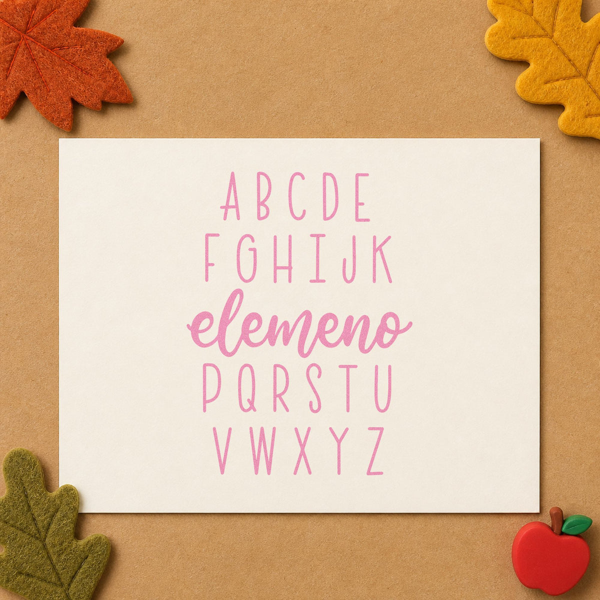 Alphabet Elemeno craft stamp in purple ink on cardstock, an easy option for letter sound tags.