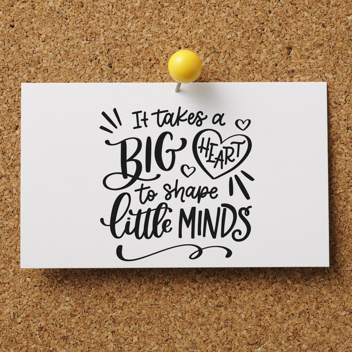 Premium Wooden Big Heart Little Minds Stamp - Vintage Pro imprint stamped in black ink. An outlined heart, small hearts, and decorative marks accompany "It takes a big heart to shape little minds."