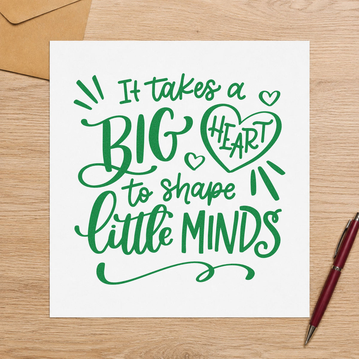 Big Heart Little Minds craft stamp imprint in green ink on a handmade project, one idea being daily report pages.