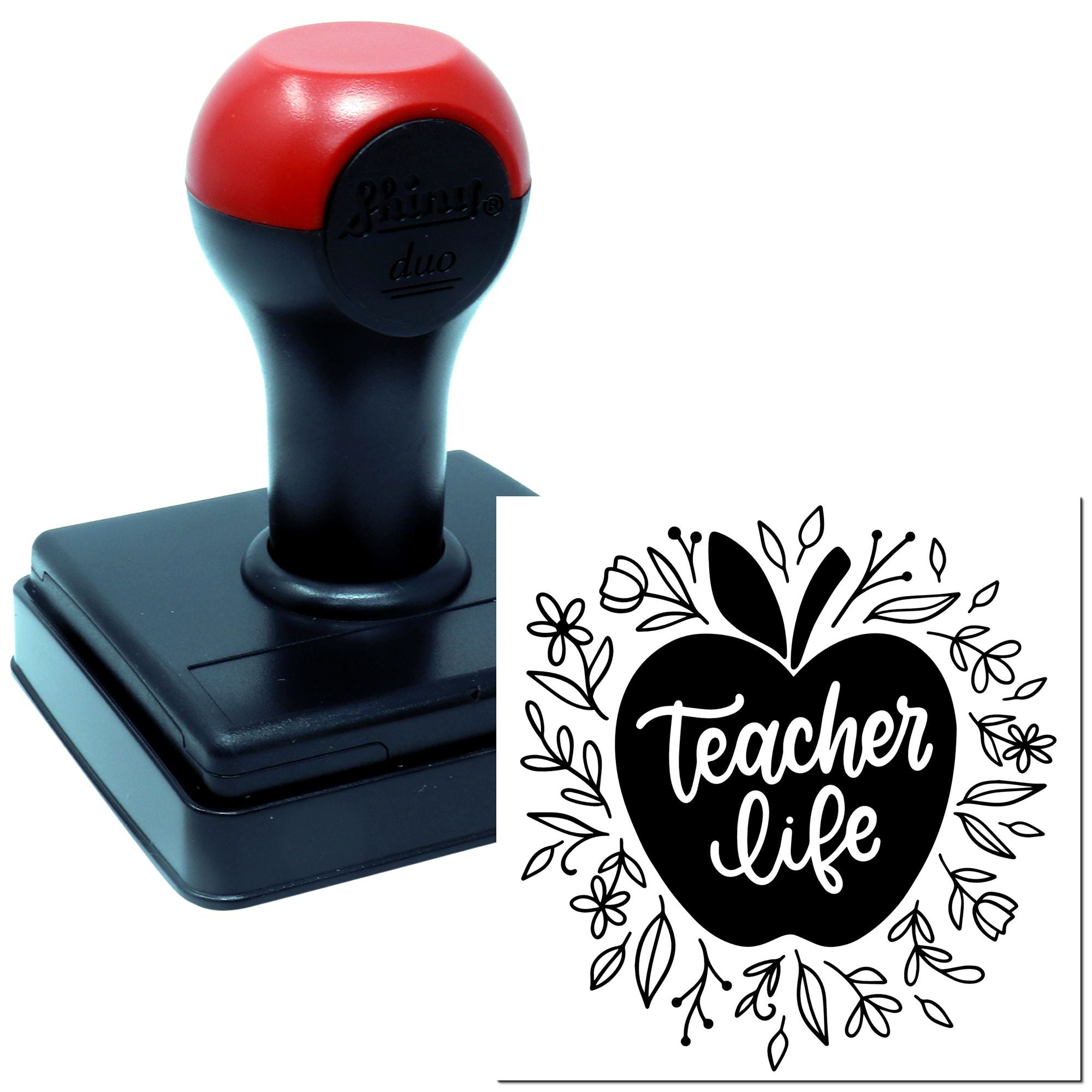 Self-inking rubber stamp with Teacher Life apple design for classroom crafts and teacher gifts.