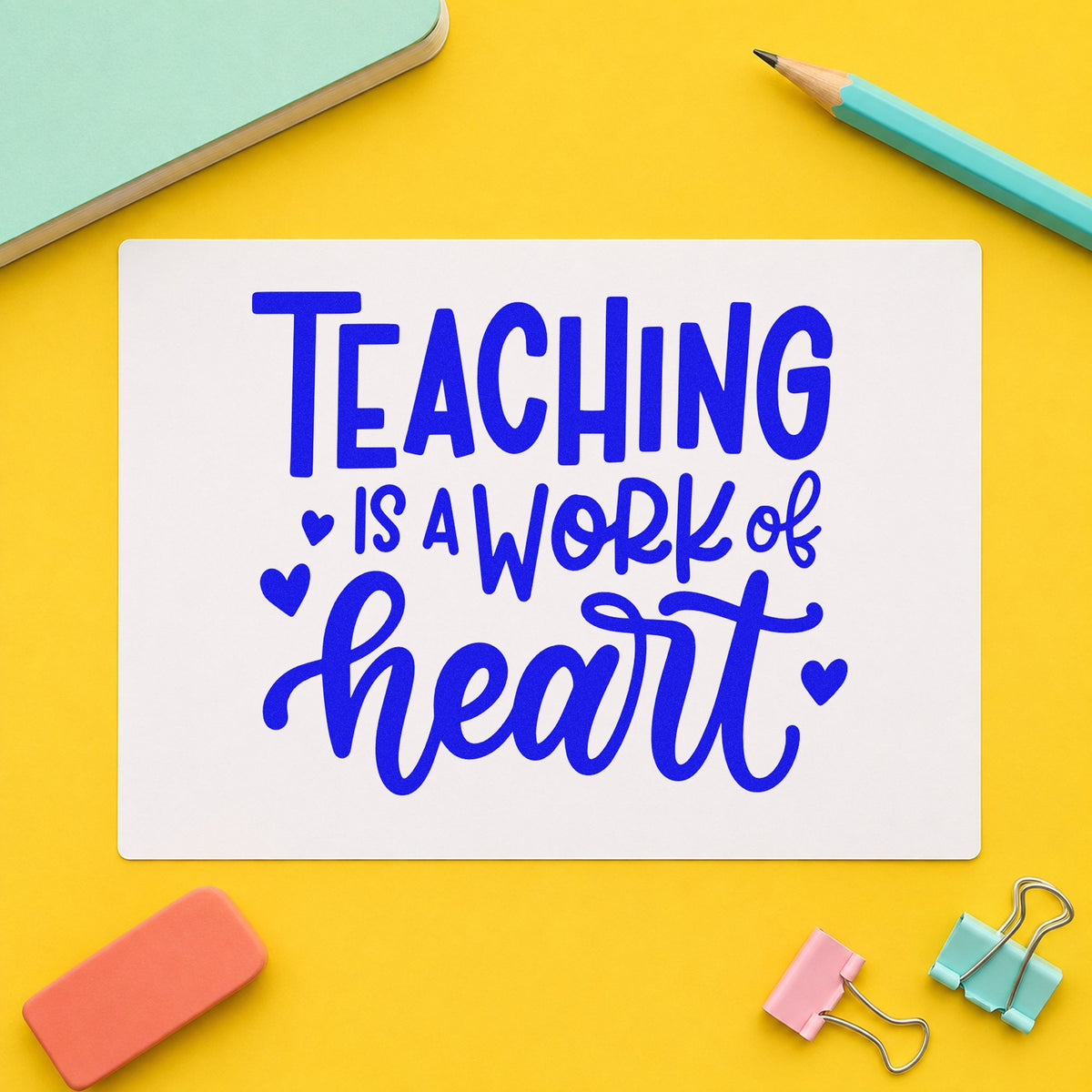 Teaching Work of Heart craft stamp imprinted in blue ink on paper, a design suited to kindness jar labels.