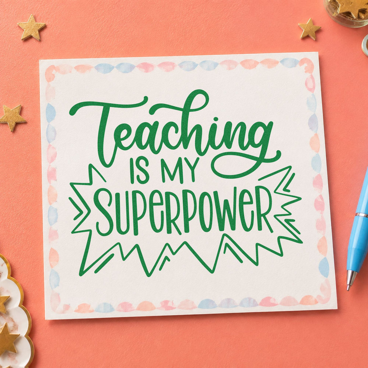 Teaching Is My Superpower craft stamp imprint in green ink on a handmade project, one idea being framed career wall.